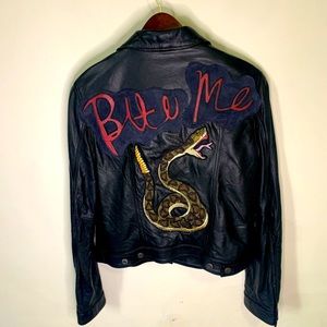 BITE ME, BABY!!
Black washed leather Denim style jacket with handmade patch